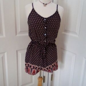 Cute black and orange romper.